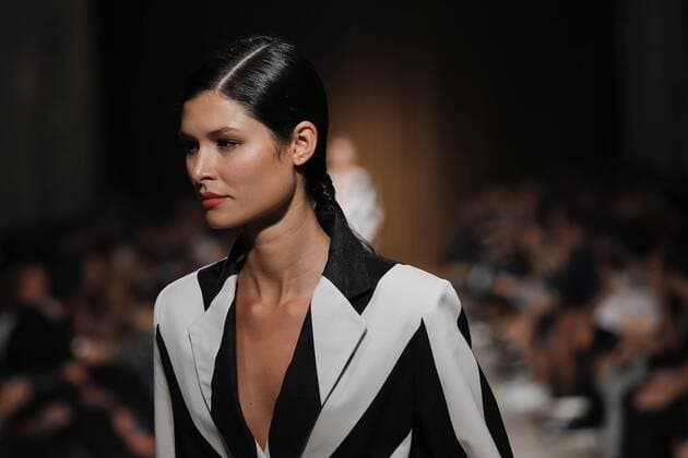 Oct. 10, 2015 - Lisbon, Portugal - Model presents spring summer 2016 creation by designer Miguel Vieira during the 45rd edition of Moda Lisboa Fashion Week at the Patio da Gale on Terreiro do Paco Square in Lisbon on October 10, 2015. NURPHOTO CARLOS PALMA. Lisbon Portugal  - ZUMAn230