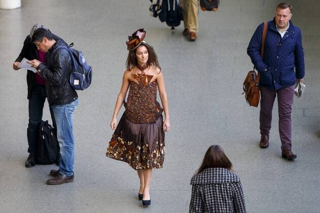 Oct. 12, 2015 - London, London, UK - London, UK. Models dressed in clothing made entirely from chocolate showcasing The Chocolate Show s fashion collection at St Pancras International station on Monday, 12 October, 2015. London UK  - ZUMAl94_