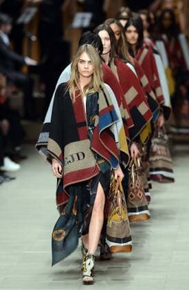 Burberry shares plunge; FTSE 100 trades higher. SOurce - BBC NEWS Cara Delevingne closes the Burberry Prorsum show at London Fashion Week A W 14, Monday, 17th February 2014.  xStephenxLockx xi-Imagesx IIM-11235-0003