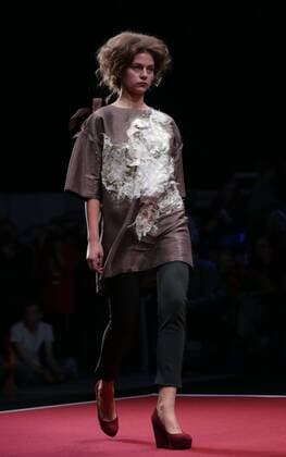 MOSCOW, RUSSIA. OCTOBER 16, 2015. A model wears a creation by designer Sergey Sysoyev for a spring summer 2016 collection at Plus Size Fashion Weekend Show during the 34th Moscow Fashion Week in Gostiny Dvor. Artyom Geodakyan TASS  TS00FFC1