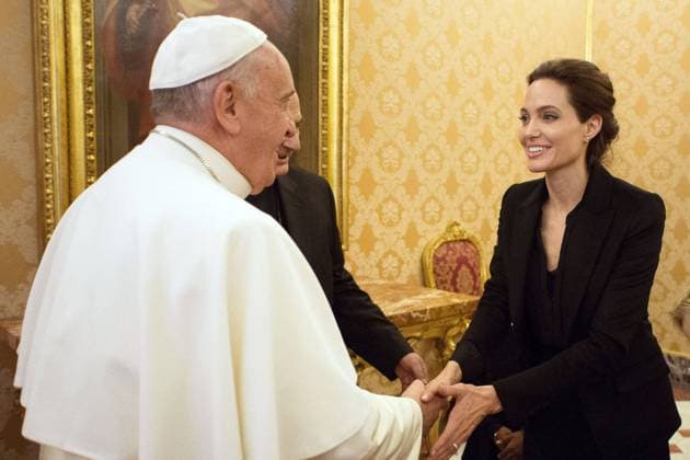Jan. 8, 2015 - Vatican City, VA - Pope Francis greets Angelina Jolie, at the Vatican, Thursday, Jan. 8, 2015. The actress, director and U.N. special envoy met briefly with Pope Francis Thursday in the Apostolic Palace after screening her film Unbroken to some Vatican officials and ambassadors.  - ZUMAp12