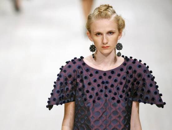 Models present creations by Belorusian designer Anna Zabelina during the Ukrainian Fashion Week in Kiev on October 18, 2015.  KIE2015101827 IVANxVAKOLENKO
