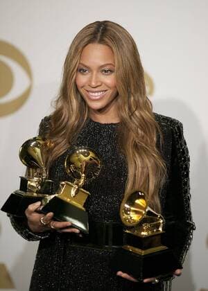 Feb. 8, 2015 - Los Angeles, California, U.S - BEYONCE juggles multiple awards in the Press Room during the 57th Grammy Awards at the Staples Center.  - ZUMAp12