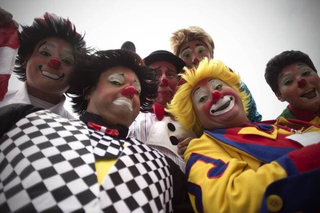 Clowns pose for a group photo in the 20th International Clowns Convention in Mexico City, capital of Mexico, on Oct. 21, 2015. During the convention that is being held here from Oct. 19 to 22, clowns from different countries and regions shared their experiences, made performances and took part in various contests. ) MEXICO-MEXICO CITY-CLOWNS-CONVENTION AlejandroxAyala 