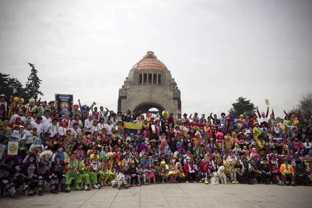Clowns pose for a group photo in the 20th International Clowns Convention in Mexico City, capital of Mexico, on Oct. 21, 2015. During the convention that is being held here from Oct. 19 to 22, clowns from different countries and regions shared their experiences, made performances and took part in various contests. ) MEXICO-MEXICO CITY-CLOWNS-CONVENTION AlejandroxAyala 