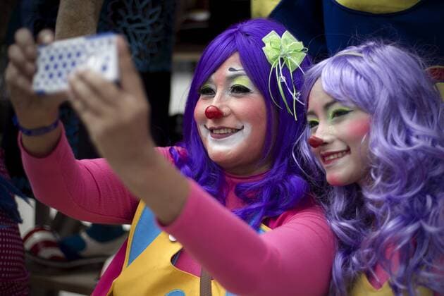 Clowns take a selfie in the 20th International Clowns Convention in Mexico City, capital of Mexico, on Oct. 21, 2015. During the convention that is being held here from Oct. 19 to 22, clowns from different countries and regions shared their experiences, made performances and took part in various contests. ) MEXICO-MEXICO CITY-CLOWNS-CONVENTION AlejandroxAyala 
