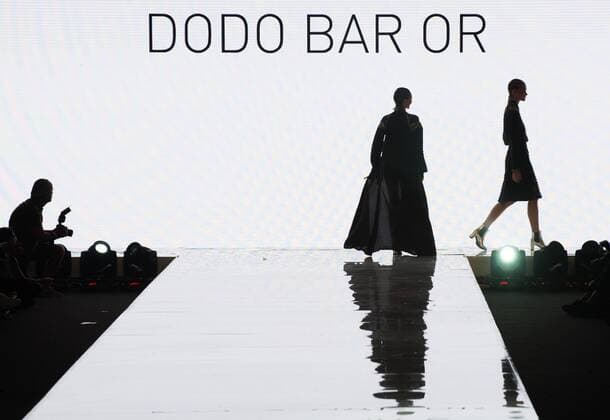 Models present creations of Dodo Bar Or during Gindi Tel Aviv Fashion Week in Tel Aviv, Israel, on Oct. 21, 2015. The four-day Gindi Tel Aviv Fashion Week ended here on Wednesday. ) ISRAEL-TEL AVIV-FASHION WEEK LixRui 