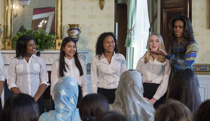 Berühmte Feministinnen, Michelle Obama First Lady Michelle Obama congratulates students from the Washington Performing Arts Society Children?s Choir for their performance in support of the Let s Girls Learn initiative in the Blue Room of the White House in Washington, DC on October 22, 2015. The First Lady announced a new partnership to further adolescent girls? education in Pakistan.  WAP20151022222 PATxBENIC