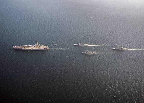 Dec. 1, 2014 - Uss Carl Vinson, United States of America - U.S. Navy nuclear aircraft carrier USS Carl Vinson sails in formation with the Royal Navy Daring-class air defence destroyer HMS Defender, the guided-missile cruiser USS Bunker Hill and the French Marine Nationale anti-air frigate FS Jean Bart during operations November 9, 2014 in the Arabian Sea. The group is deployed for Operation Inherent Resolve striking ISIS targets in Iraq and Syria. Uss Carl Vinson United States of America - ZUMAp138