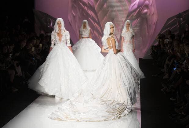 Models walk the runway wearing Mikael D SS 2016 collection during the World MasterCard Toronto Fashion Week Spring Summer 2016 at David Pecaut Square in Toronto, Canada, Oct. 23, 2015. ) CANADA-TORONTO-FASHION WEEK ZouxZheng 