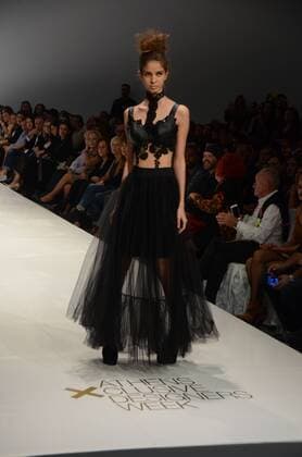 Oct. 24, 2015 - Athens, Greece - A model wears a creation of Tassos Mitropoulos fashion designer. Fashion designers present their creations as part of 2nd Day of the 18th Athens Xclusive Designers Week fashion event in Athens. Athens Greece - ZUMAp133