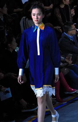 (151025) -- BEIJING, Oct. 25, 2015 -- A model presents a creation of B+ by beautyberry Collection during the China Fashion Week spring summer 2016 in Beijing, capital of China, Oct. 25, 2015. ) (mt) CHINA-BEIJING-FASHION WEEK-OPENING (CN) LixMingfang 