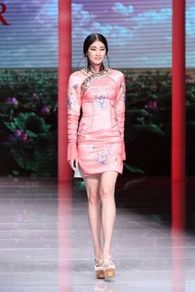 BEIJING, CHINA - OCTOBER 25: (CHINA OUT) A model showcases designs on the runway at NE-TIGER Haute Couture Collection during the Mercedes-Benz China Fashion Week S S 2016 at Beijing Hotel on October 25, 2015 in Beijing, China.  CFP474868188