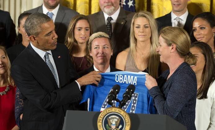 U.S. President Barack Obama is awarded a team jersey by coach Jill Ellis and Obama honors the U.S. Women s 2015 World Cup champion team at an event in the East Room of the White House in Washington DC on October 27, 2015. Obama said they inspired millions of girls to dream bigger .  WAP2015102706 PATxBENIC
