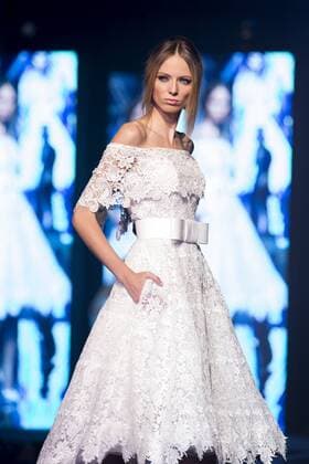 Oct. 26, 2015 - Naples, Italy, Italy - A model wears the bridal gown designed by Pinella Passaro during the Tuttosposi 2015 at Mostra d Oltremare. Naples Italy - ZUMAp133
