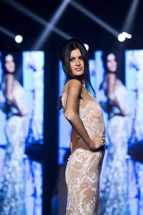 Oct. 26, 2015 - Naples, Italy, Italy - A model wears the bridal gown designed by Pinella Passaro during the Tuttosposi 2015 at Mostra d Oltremare. Naples Italy - ZUMAp133