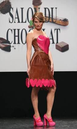 A model wears a creation made with chocolate during a fashion show at the inauguration of the 21st annual Salon du Chocolat in Paris on October 27, 2015. The show, the world s biggest dedicated to chocolate, brings together fashion designers and chocolatiers from around the world.  PAR20151027718 DAVIDxSILPA