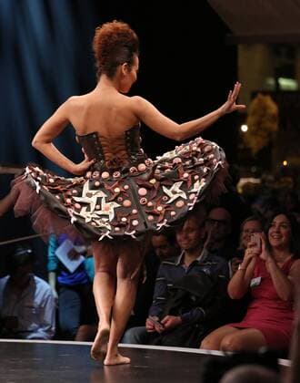 A model wears a creation made with chocolate during a fashion show at the inauguration of the 21st annual Salon du Chocolat in Paris on October 27, 2015. The show, the world s biggest dedicated to chocolate, brings together fashion designers and chocolatiers from around the world.  PAR20151027703 DAVIDxSILPA