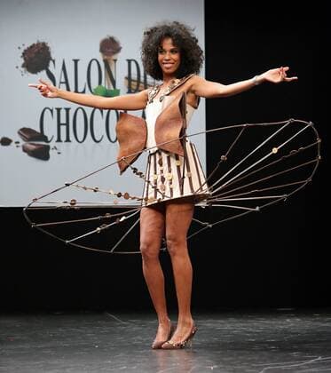 A model wears a creation made with chocolate during a fashion show at the inauguration of the 21st annual Salon du Chocolat in Paris on October 27, 2015. The show, the world s biggest dedicated to chocolate, brings together fashion designers and chocolatiers from around the world.  PAR20151027705 DAVIDxSILPA