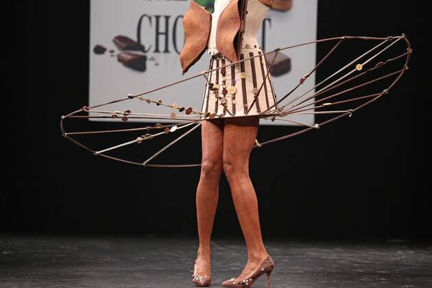 A model wears a creation made with chocolate during a fashion show at the inauguration of the 21st annual Salon du Chocolat in Paris on October 27, 2015. The show, the world s biggest dedicated to chocolate, brings together fashion designers and chocolatiers from around the world.  PAR20151027707 DAVIDxSILPA