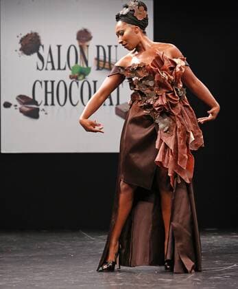 A model wears a creation made with chocolate during a fashion show at the inauguration of the 21st annual Salon du Chocolat in Paris on October 27, 2015. The show, the world s biggest dedicated to chocolate, brings together fashion designers and chocolatiers from around the world.  PAR20151027708 DAVIDxSILPA