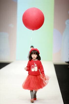 BEIJING, Oct. 28, 2015 -- A child model presents a creation designed by Li Lieqing at the M.latin Children s Wear Collection during the China Fashion Week in Beijing, capital of China, Oct. 28, 2015. ) (ry) CHINA-BEIJING-FASHION WEEK (CN) ChenxJiannan 