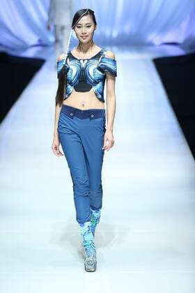 BEIJING, CHINA - OCTOBER 29: (CHINA OUT) A model showcases designs on the runway at TORAY Liu Wei Collection during the Mercedes-Benz China Fashion Week Spring Summer 2016 at 751DÂ·PARK on October 29, 2015 in Beijing, China.  CFP475107367