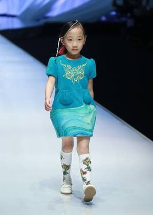 BEIJING, CHINA - OCTOBER 29: (CHINA OUT) A model showcases designs on the runway at TORAY Liu Wei Collection during the Mercedes-Benz China Fashion Week Spring Summer 2016 at 751DÂ·PARK on October 29, 2015 in Beijing, China.  CFP475107369