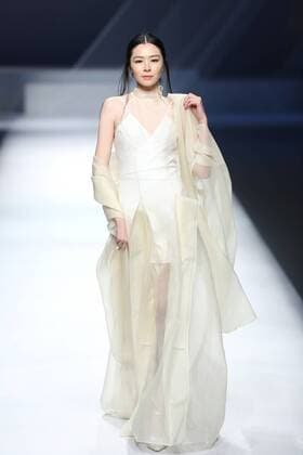 BEIJING, CHINA - OCTOBER 29: (CHINA OUT) A model showcases designs on the runway at GaryWat Qu Tingnan Collection during the Mercedes-Benz China Fashion Week Spring Summer 2016 at Beijing Hotel on October 29, 2015 in Beijing, China.  CFP475107423