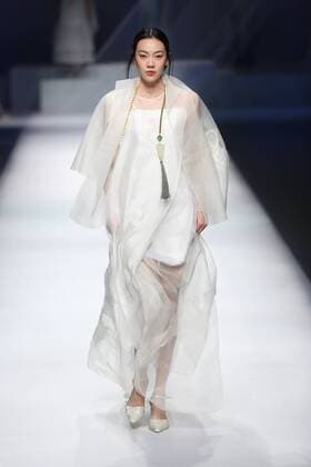 BEIJING, CHINA - OCTOBER 29: (CHINA OUT) A model showcases designs on the runway at GaryWat Qu Tingnan Collection during the Mercedes-Benz China Fashion Week Spring Summer 2016 at Beijing Hotel on October 29, 2015 in Beijing, China.  CFP475107427