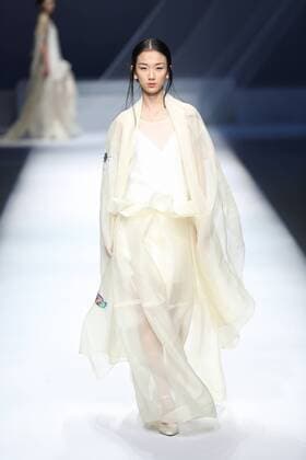 BEIJING, CHINA - OCTOBER 29: (CHINA OUT) A model showcases designs on the runway at GaryWat Qu Tingnan Collection during the Mercedes-Benz China Fashion Week Spring Summer 2016 at Beijing Hotel on October 29, 2015 in Beijing, China.  CFP475107434