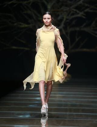 BEIJING, CHINA - OCTOBER 29: (CHINA OUT) A model showcases designs on the runway at 95 Secret Deng Zhaoping Collection during the Mercedes-Benz China Fashion Week Spring Summer 2016 at Beijing Hotel on October 29, 2015 in Beijing, China.  CFP475107093