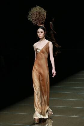 BEIJING, CHINA - OCTOBER 29: (CHINA OUT) A model showcases designs on the runway at 95 Secret Deng Zhaoping Collection during the Mercedes-Benz China Fashion Week Spring Summer 2016 at Beijing Hotel on October 29, 2015 in Beijing, China.  CFP475107100