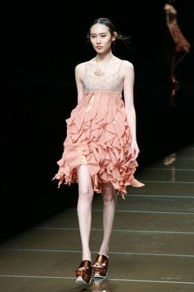 BEIJING, CHINA - OCTOBER 29: (CHINA OUT) A model showcases designs on the runway at 95 Secret Deng Zhaoping Collection during the Mercedes-Benz China Fashion Week Spring Summer 2016 at Beijing Hotel on October 29, 2015 in Beijing, China.  CFP475107103