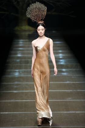 BEIJING, CHINA - OCTOBER 29: (CHINA OUT) A model showcases designs on the runway at 95 Secret Deng Zhaoping Collection during the Mercedes-Benz China Fashion Week Spring Summer 2016 at Beijing Hotel on October 29, 2015 in Beijing, China.  CFP475107120
