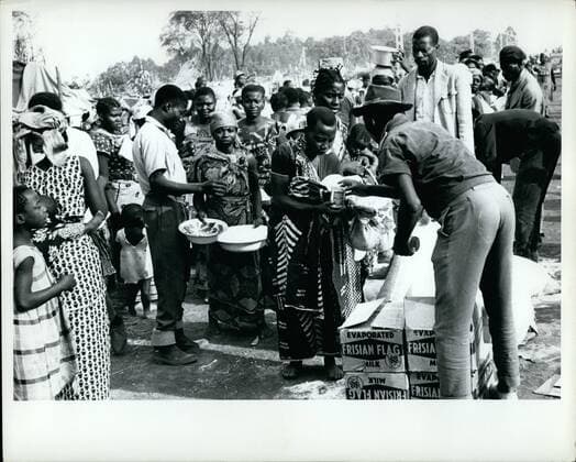 September 1961 - Elizabethville, Congo, 6 September 1961 Refugees from the conflict in the Republic of the Congo As a result of the fighting an internal unrest currently prevailing in the Katanga Province of the Republic of the Congo, some 35,000 Congolese have sought the assistance of the United Nations until they are able to return to their homes. Refugees waiting in line for food ration of flour and silk supplied by UN in a camp. - ZUMAk09_
