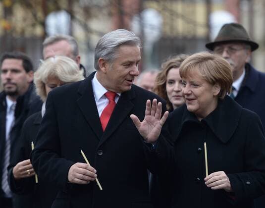 Nov. 9, 2014 - Berlin, Germany - German Chancellor Angela Merkel and Mayor of Berlin Klaus Wowereit at Berlin Wall Memorial, Bernauer StraÃƒÅ¸e, Berlin, Germany. 9th November 2014 (Photo by Artur Widak NurPhoto)  - ZUMAn23