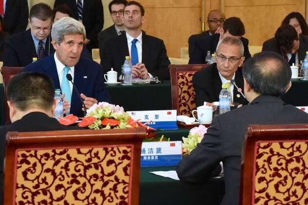 July 10, 2014 - Beijing, China - US Secretary of State John Kerry joined by White House adviser John Podesta, addresses State Councilor Yang Jiechi during opening remarks at the plenary session of the sixth U.S.-China Strategic and Economic Dialogue July 10, 2014 in Beijing, China. Beijing China - ZUMAp138