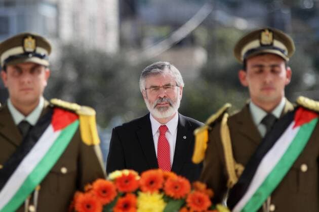 Dec. 4, 2014 - Ramallah, West Bank, Palestinian Territory - Sinn Fein leader Gerry Adams lays a wreath on the tomb of late Palestinian leader Yasser Arafat upon his arrival in the West Bank city of Ramallah on December 4, 2014 - ZUMAap3