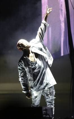 Oct. 24, 2014 - Las Vegas, Nevada - Rapper KANYE WEST is seen during the first day of the Life Is Beautiful Festival on Freemont Street in Las Vegas, NV.  - ZUMAb11