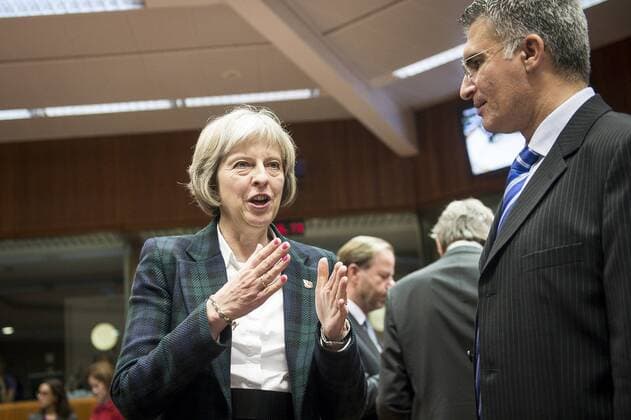 Nov. 9, 2015 - Brussels, Bxl, Belgium - British Home Secretary Theresa May (L) and Malta Home Affairs Minister Carmelo Abela prior to the European Union interior and home affairs ministers meeting on the immigration crisis at European Council headquarters in Brussels, Belgium on 09.11.2015 The EU ministers gathered to discuss the wave of refugees on the Balkan by Brussels Belgium - ZUMAw80_