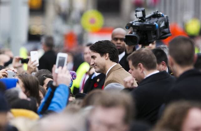 CORRECTION: PHOTOES TITLE CANADA-OTTAWA-REMEMBERANCE DAY SHOULD BE CANADA-OTTAWA-REMEMBRANCE DAY (151111) -- OTTAWA, Nov. 11, 2015 -- Canadian Prime Minister Justin Trudeau greets spectators during Remembrance Day ceremonies at the National War Memorial in Ottawa, Canada, Nov. 11, 2015. ) (CORRECTION)CANADA-OTTAWA-REMEMBRANCE DAY ChrisxRoussakis 