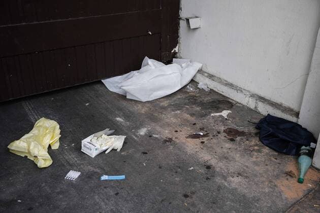 Bloodstain and belonging are seen on the ground outside the Bataclan concert hall in Paris, France, Nov. 14, 2015. ) (zjy) FRANCE-PARIS-ATTACK-BATACLAN CONCERT HALL ZhouxLei 
