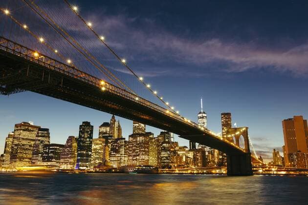 USA, New York, New York City, Manhattan, Brooklyn Bridge and skyline during a summer night  GIOF000332