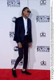 Recording artist Wiz Khalifa arrives for the 43rd annual American Music Awards held at Microsoft Theater in Los Angeles on November 22, 2015.  LAP20151122190 JIMxRUYMEN