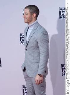 Singer Nick Jonas arrives for the 43rd annual American Music Awards held at Microsoft Theater in Los Angeles on November 22, 2015.  LAP20151122191 JIMxRUYMEN