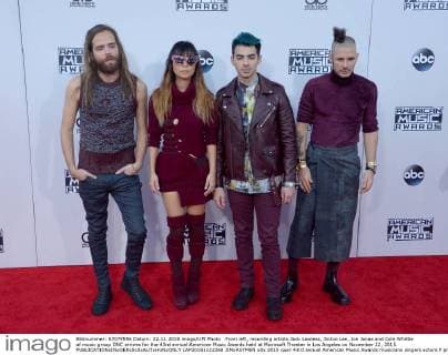 From left, recording artists Jack Lawless, JinJoo Lee, Joe Jonas and Cole Whittle of music group DNC arrives for the 43rd annual American Music Awards held at Microsoft Theater in Los Angeles on November 22, 2015.  LAP20151122268 JIMxRUYMEN