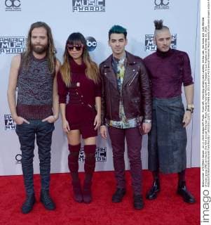 From left, recording artists Jack Lawless, JinJoo Lee, Joe Jonas and Cole Whittle of music group DNC arrives for the 43rd annual American Music Awards held at Microsoft Theater in Los Angeles on November 22, 2015.  LAP20151122271 JIMxRUYMEN