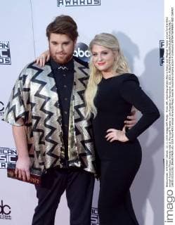 From left, recording artists Who is Fancy and Meghan Trainor arrive for the 43rd annual American Music Awards held at Microsoft Theater in Los Angeles on November 22, 2015.  LAP20151122282 JIMxRUYMEN