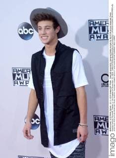 Internet personality Cameron Dallas arrives for the 43rd annual American Music Awards held at Microsoft Theater in Los Angeles on November 22, 2015.  LAP20151122286 JIMxRUYMEN